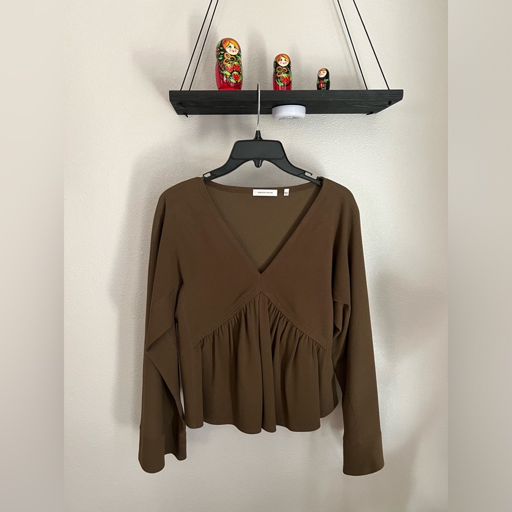 Olive green long sleeve top. The pictures don’t do the color justice.